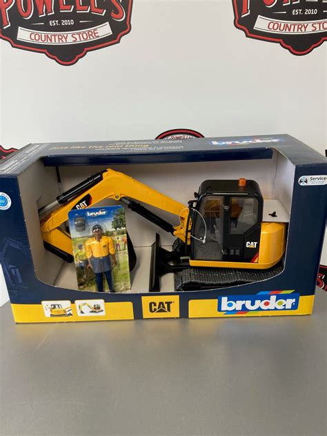 bruder caterpillar mini excavator with worker|bruder cat mini.